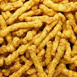 High-resolution image of crunchy, golden-brown fried snack sticks from Pune, India.